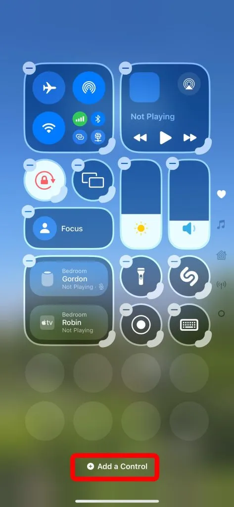 Tap the 'Add a Control' button at the bottom of the Control Center on iPhone.