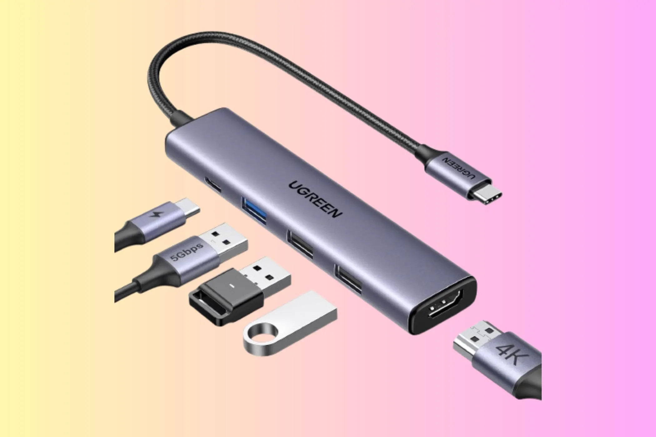 グラデーションの背景にUGREEN Revodok 105 5-in-1 USB-Cハブ